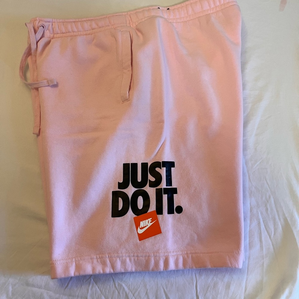 Light pink men’s XL Nike shorts soft sweatpants material